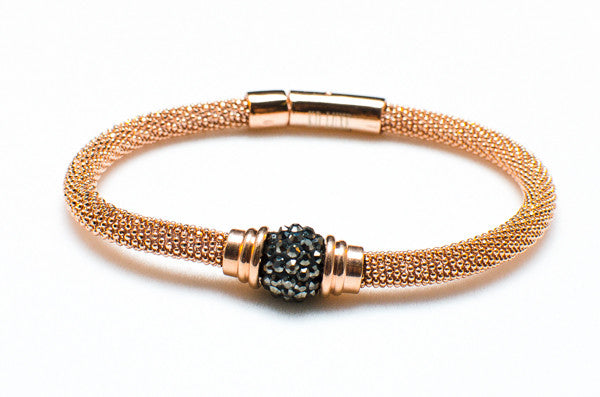 Carried Away gold bracelet with black pave center stone